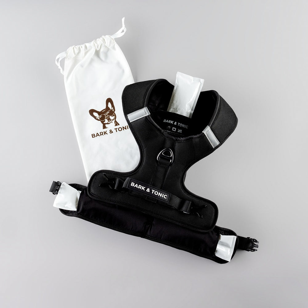 Bark & Tonic replacement cooling gel packs in their cotton pouch, beside the Signature harness